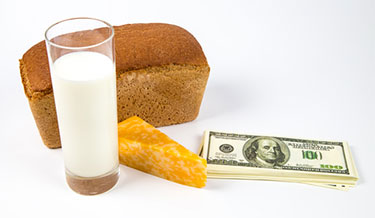 En limpa bröd, mjölk och dollar sedlar